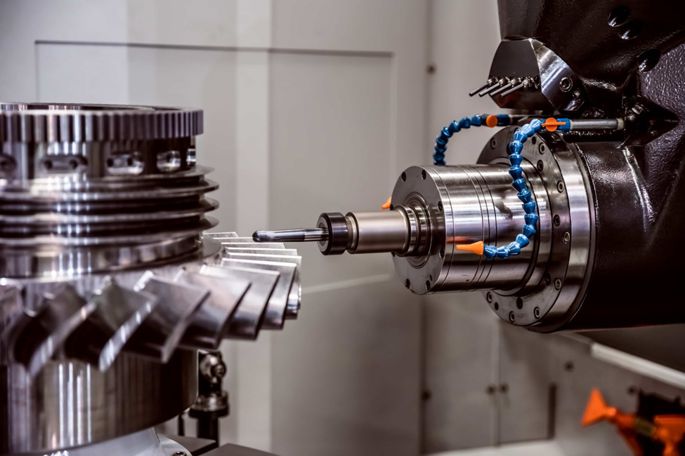 A horizontal CNC milling machine performing a milling operation on a metal part