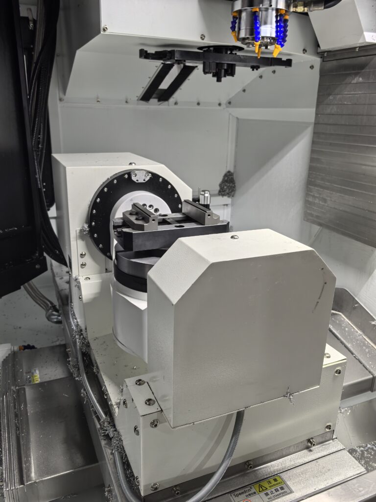 Facilities 4 Rotary workholding fixture and spindle inside a CNC machining center
