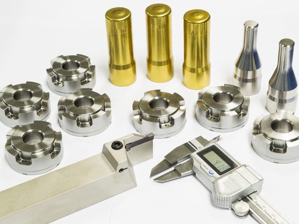 Precision CNC machined components with digital caliper
